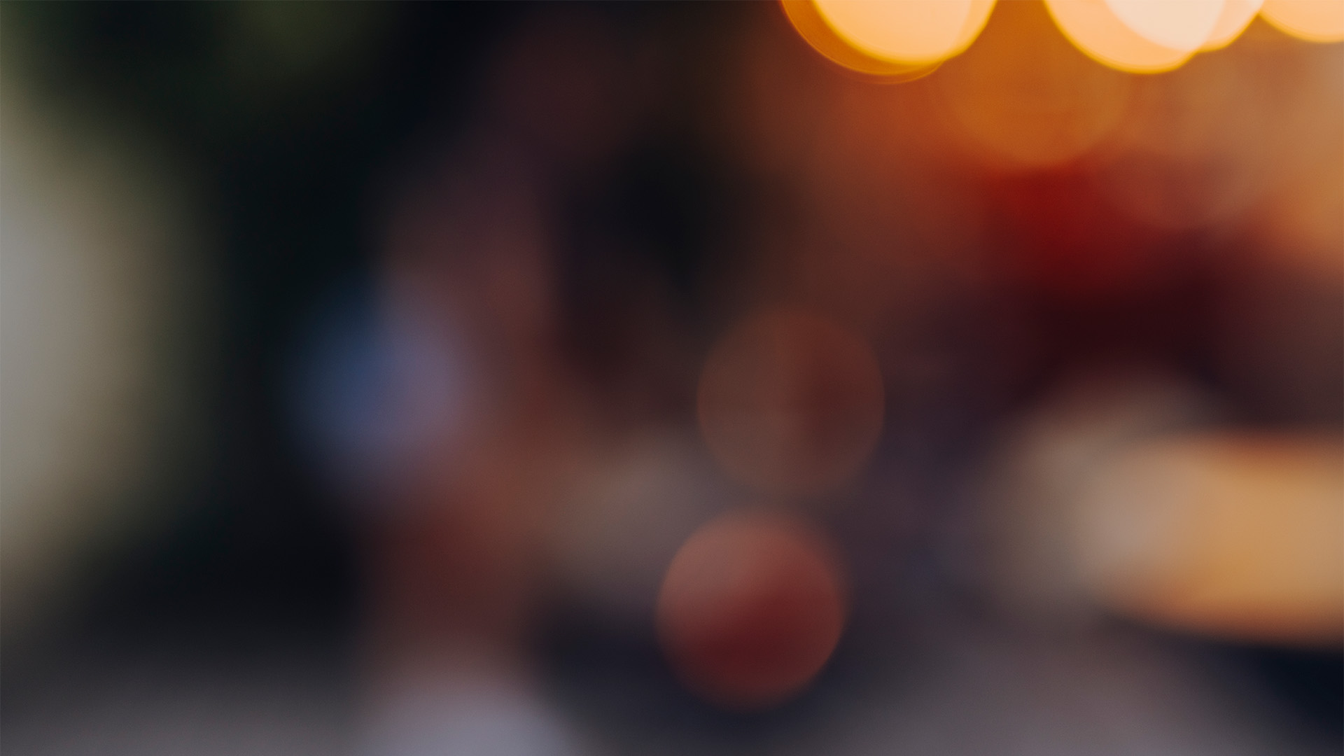 Scene showing a blurry image of a candlelights