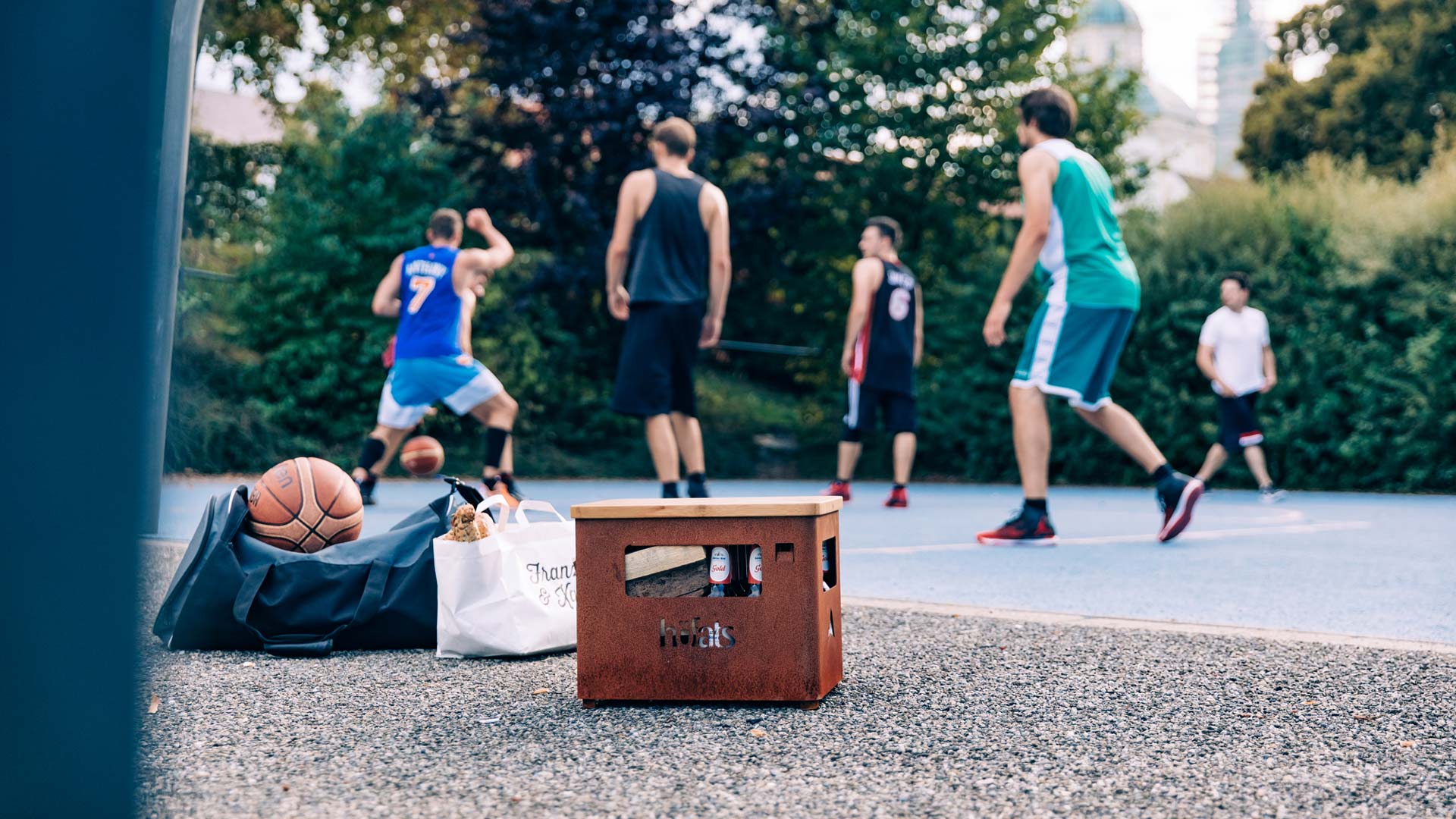 This image shows a box with a basketball ball on it, with the BEER BOX Board.