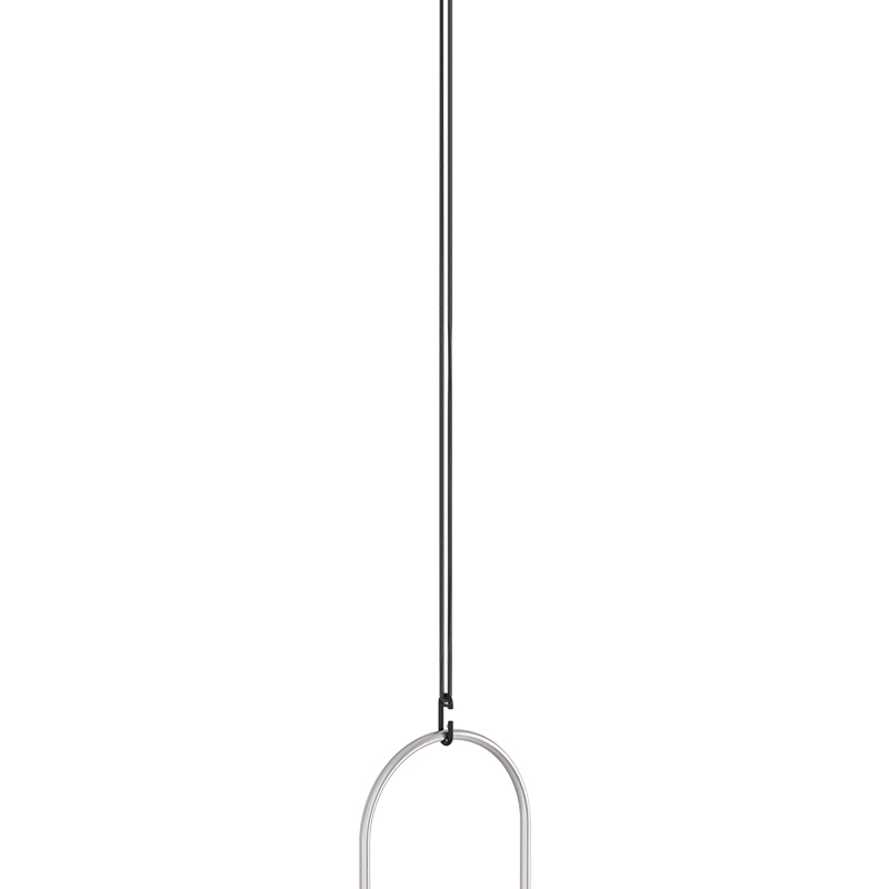A view of a black and white pendant light with a white glass shade, with the OVAL CANDLE Hanging Rope.