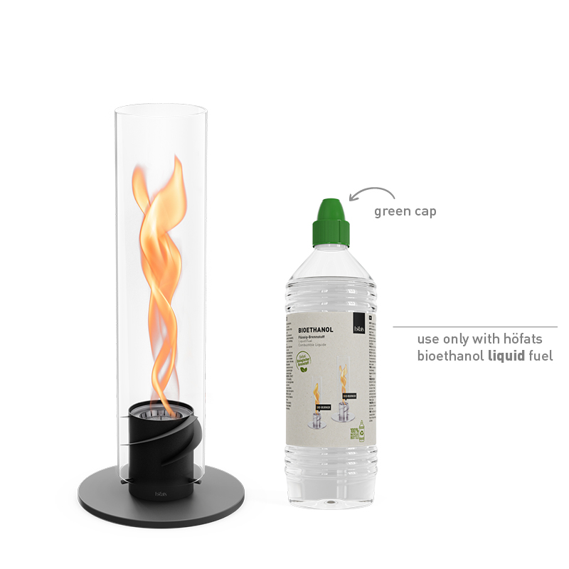 SPIN 900 Tabletop Fireplace black A white background with the 00700 Spin 1200 Tablefire black and a bottle of bioethanol liquid