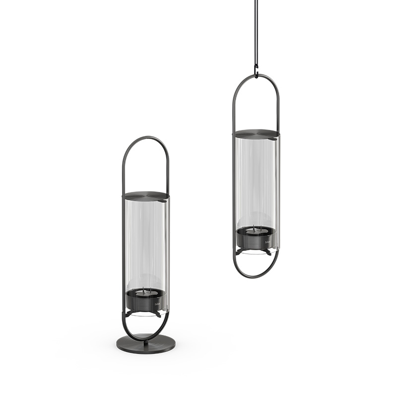 Depicted here is two black metal lanterns with glass shades, with the OVAL CANDLE 35 Base black.