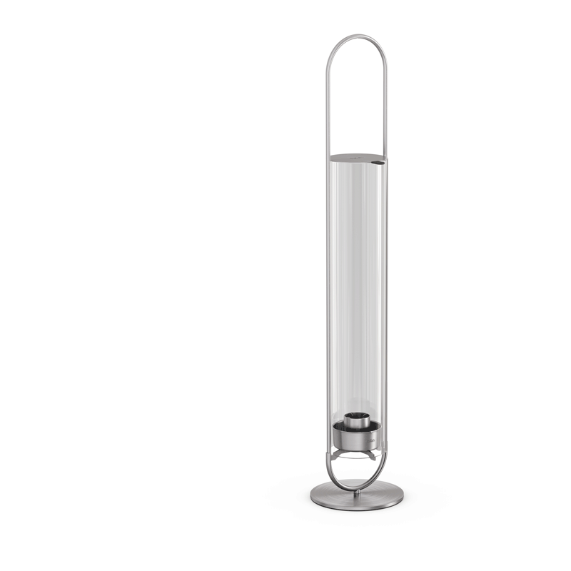 Scene showing a metal body with a glass tube, where the Oval Candle stands out for its practical elegance.