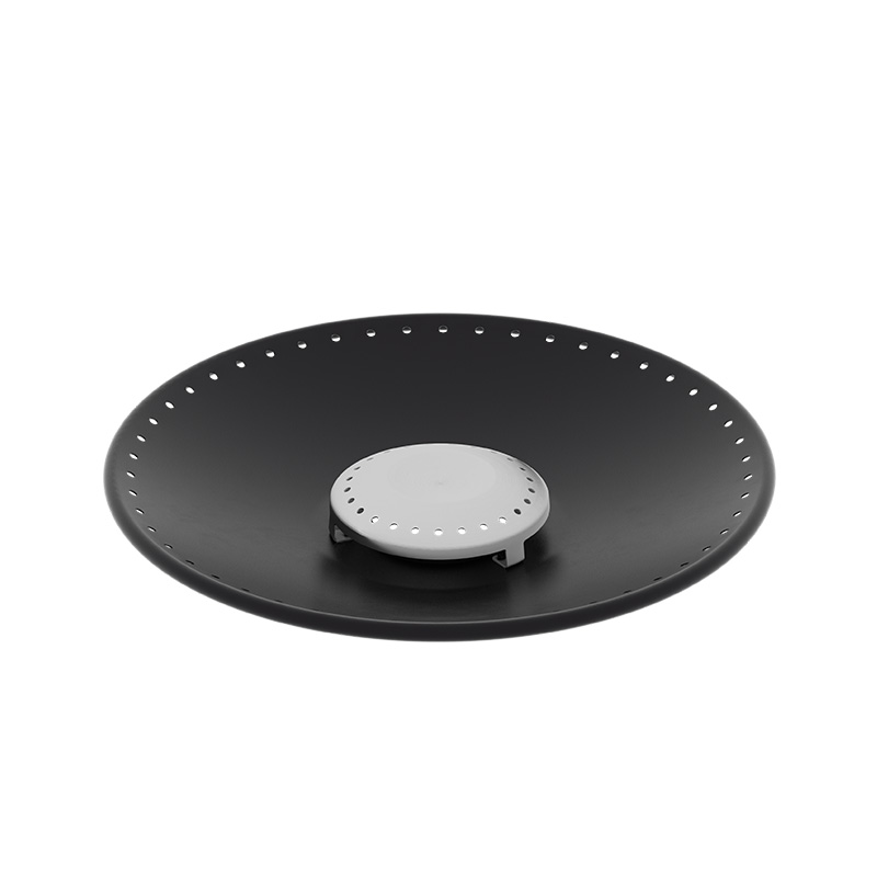 A view of a black and white circular fire pit cover, with the BOWL 57 Ash Tray.