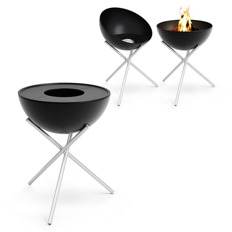 An image showing two black firebowls with a fire in the middle, with the BOWL 70 Plancha BBQ Set high.
