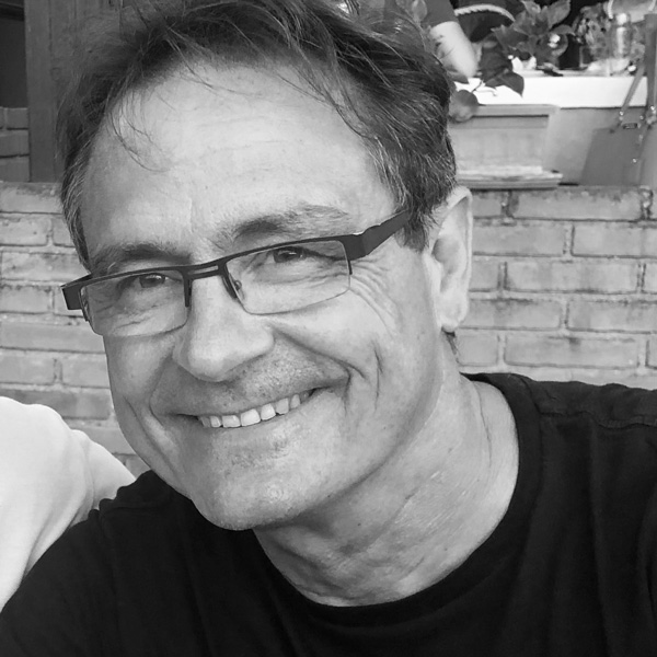 a man and woman sitting next to each other people