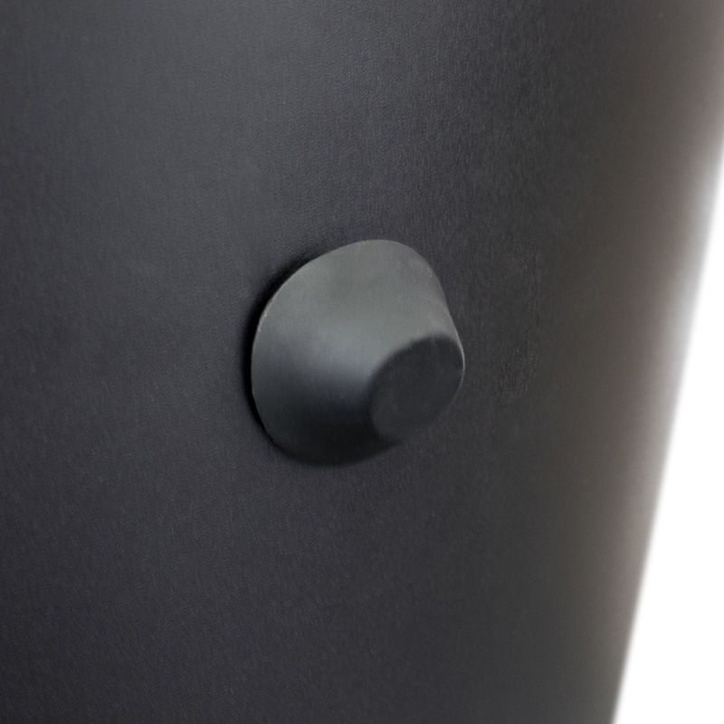 a black knob with a round hole.
