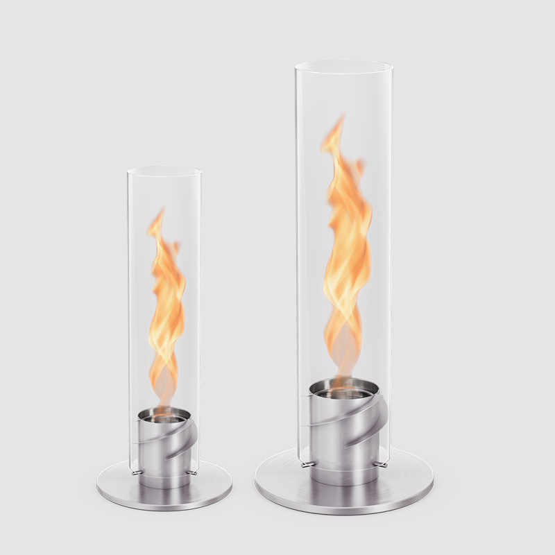 a pair of glass and metal Fireplaces with flames.