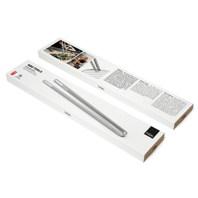 An inviting scene highlights the bbq tong Packaging, blending effortlessly into its surroundings.