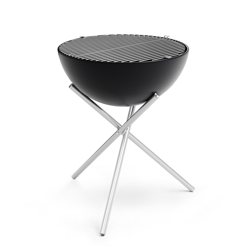 A view of a barbecue grill with a black grill top, with the BOWL 70 Grid.