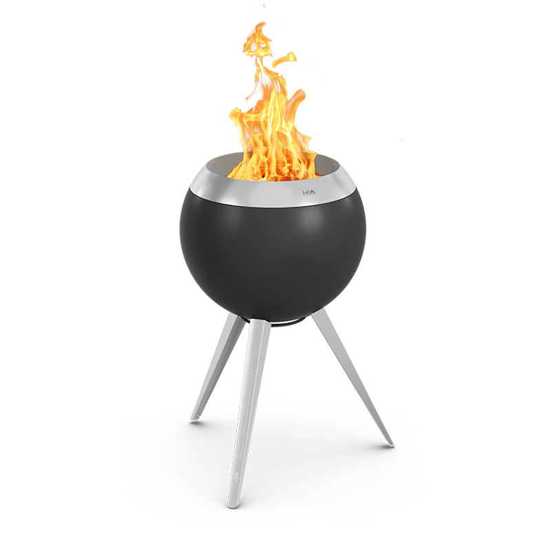 MOON 45 Plancha BBQ Set high A black fire pit with a flame on top, with the 00963 Moon 45 Plancha BBQ Set high adding a functional and elegant touch to the scene.