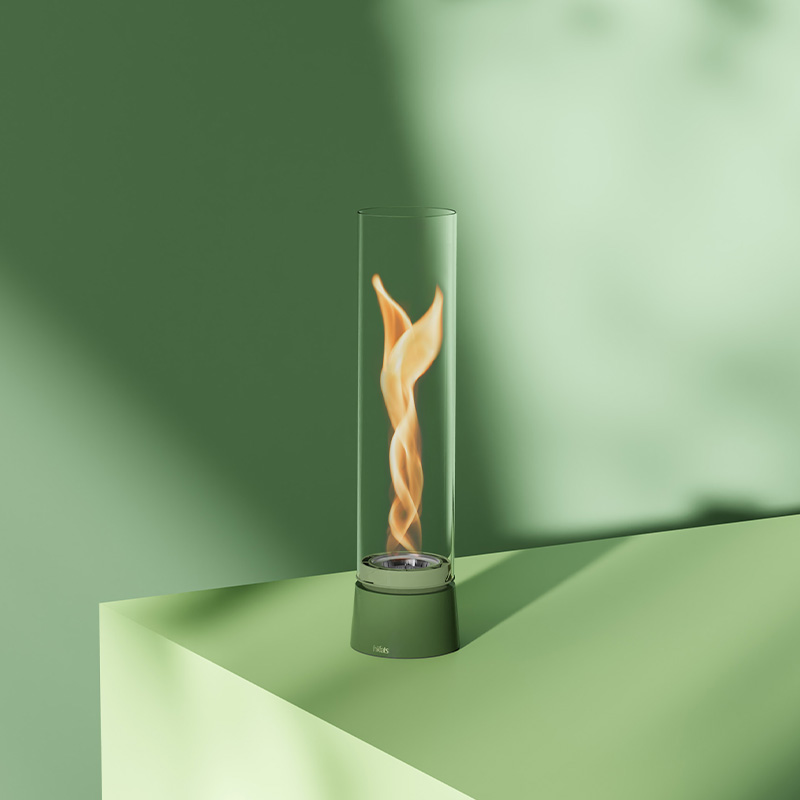 SPIN air 900 Tabletop Fireplace enamel green An inviting scene with a spin with a flame inside, highlighted by the presence of the 00818 Spin Air 900 Tablefire Emaille green