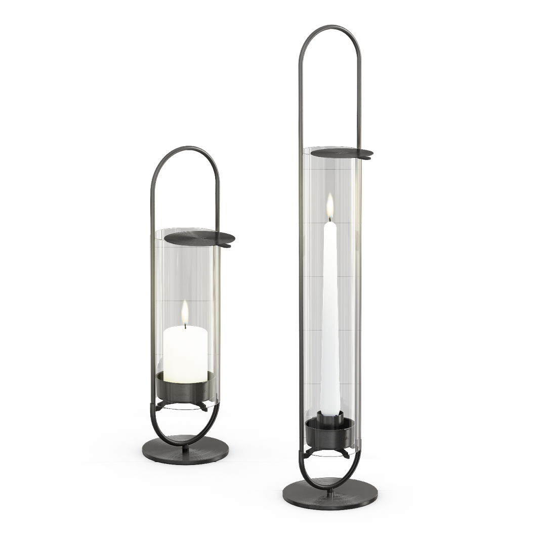 a pair of black metal candle holders with candles, shown is the product OVAL Candle 35 and 55