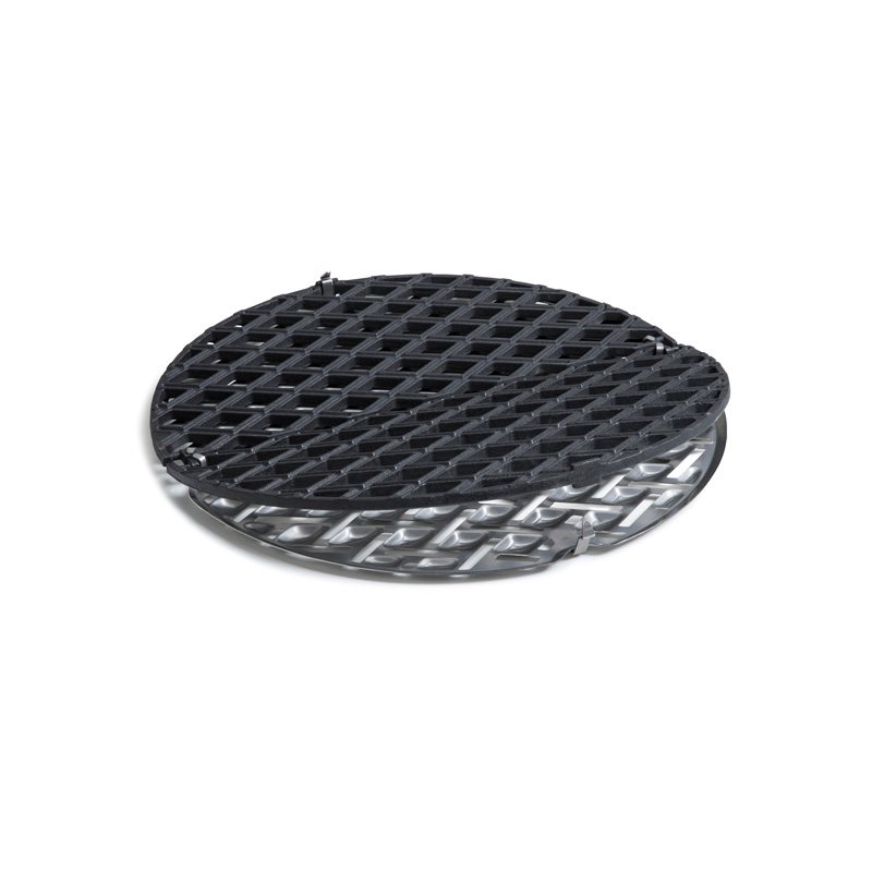 Scene showing a black round metal grid, where the CONE Cast Iron Grid stands out for its practical elegance.