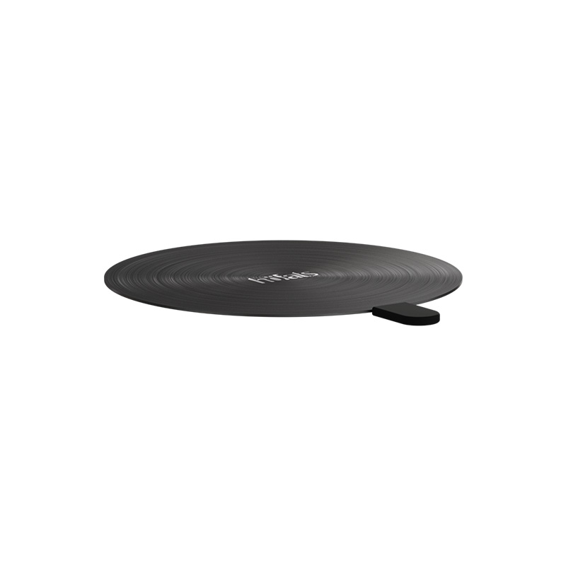 An inviting scene with a black plate with a white background, highlighted by the presence of the 00284 Oval Candle 55 Lid black