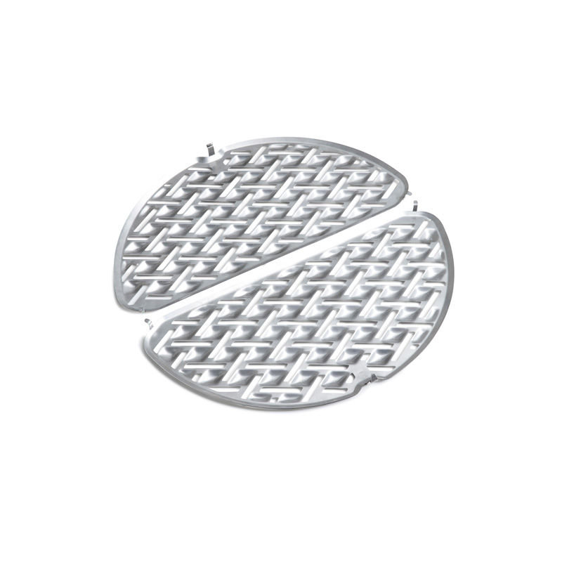 Scene showing a black round metal grid, where the CONE Cast Iron Grid stands out for its practical elegance.