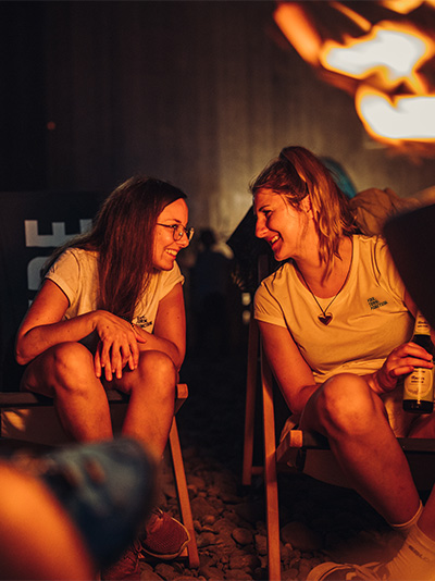 A depiction of a white t shirt hanging on a hanger
