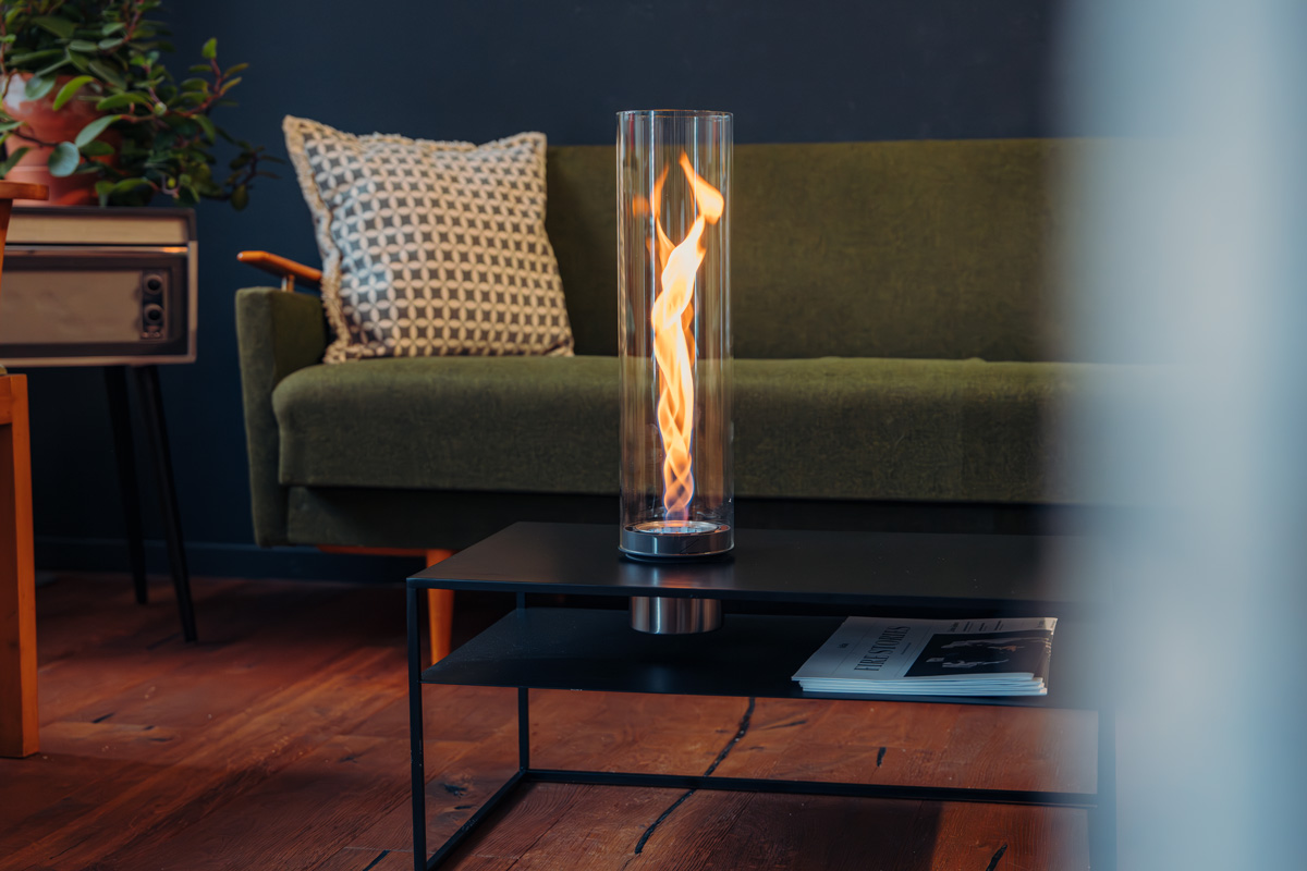SPIN air 900 Built-in A green couch, enriched by the presence of the 00975 Spin Air 1200 Built-in, which merges design with utility.