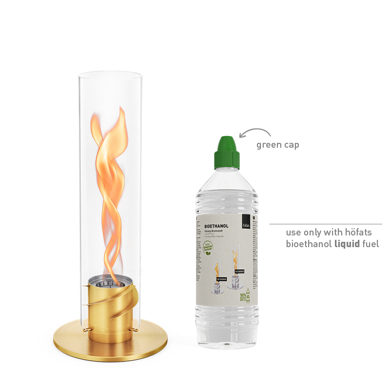 A white background with the 00699 Spin 1200 Tablefire gold and a bottle of bioethanol liquid