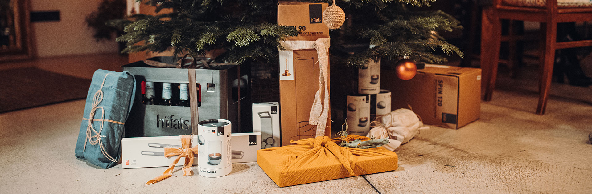 A christmas tree with a bunch of presents