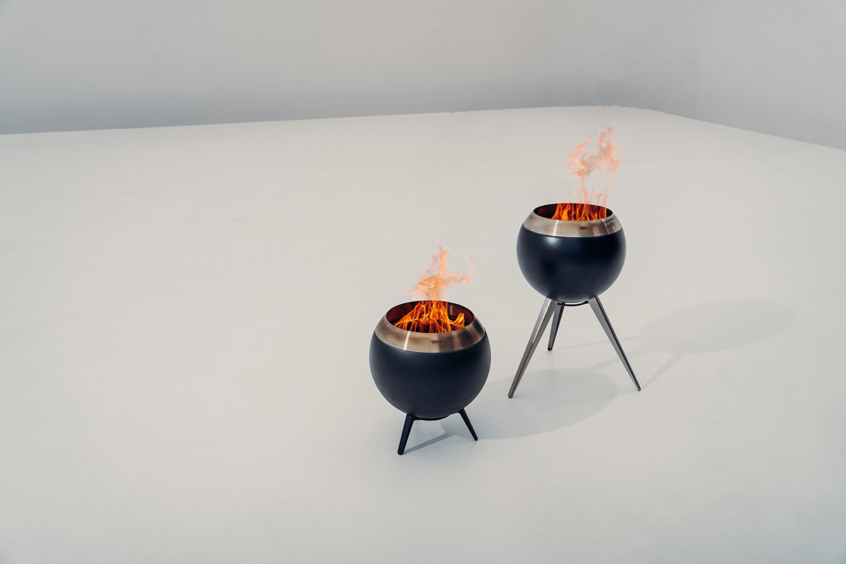 The 00717 Moon 45 with high stand is shown as two black fire pits, creating a stylish and accessible visual.