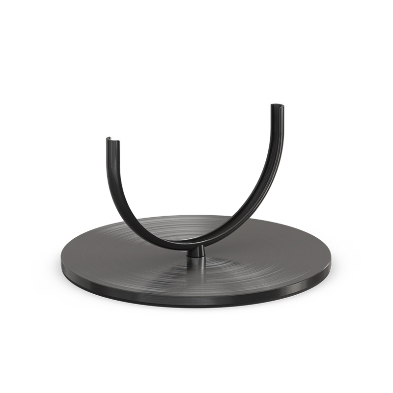 The 00279 Oval Candle 55 base black is shown as a black metal stand with a circular base, creating a stylish and accessible visual.