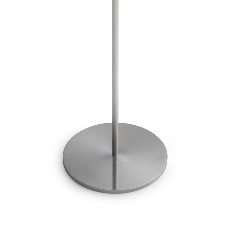 Illustrated is a round table with a metal base, with the GRAVITY CANDLE Base.