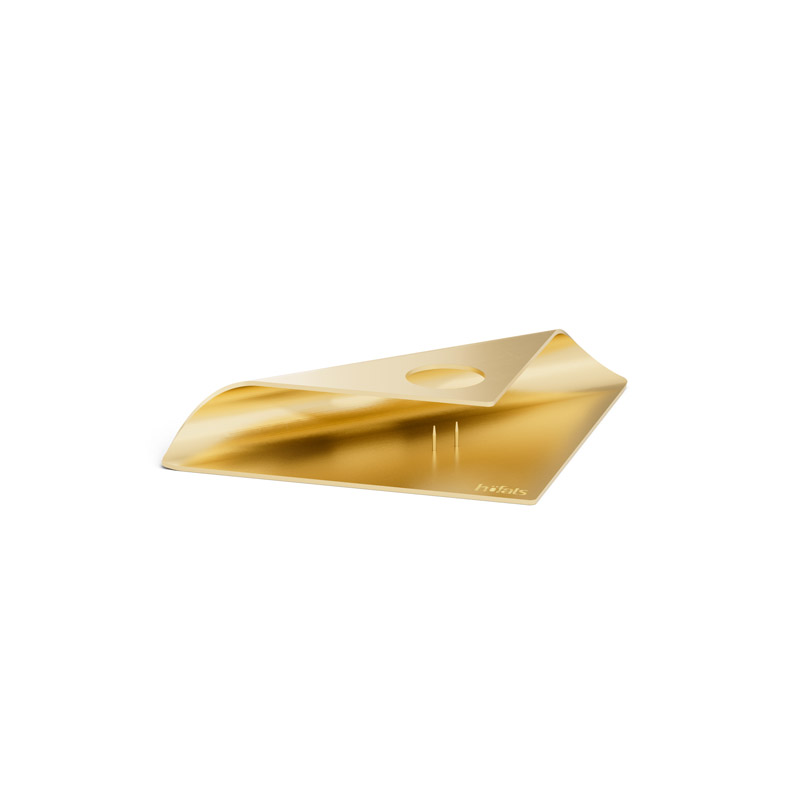 SQUARE CANDLE Candleholder gold An image showing a gold plate with a curved edge, with the SQUARE CANDLE Candleholder gold.