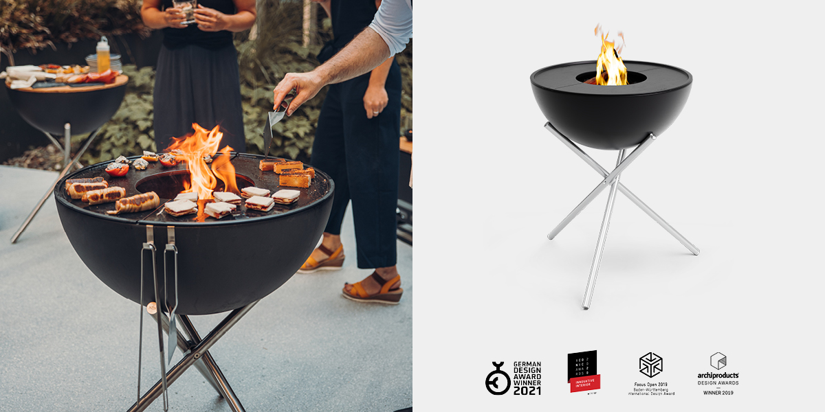 a man is cooking food on a grill.