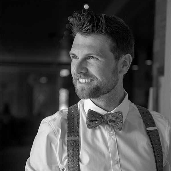 a man with a beard and a bow tie