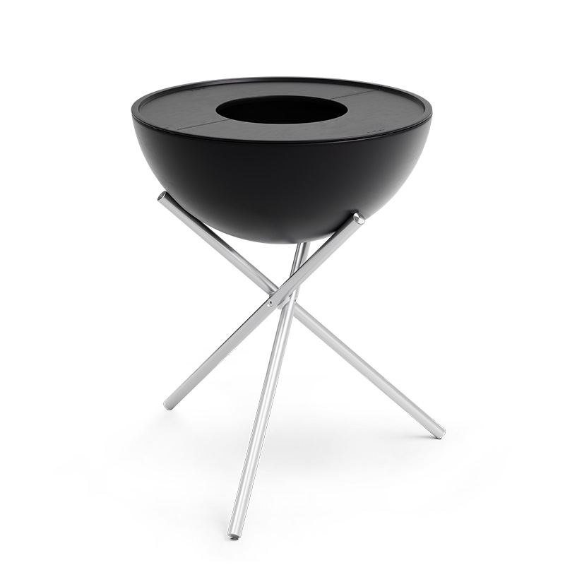 BOWL 70 Plancha A depiction of a black barbecue grill with a metal stand, featuring the 00263 Bowl 70 Plancha as a central and purposeful element.