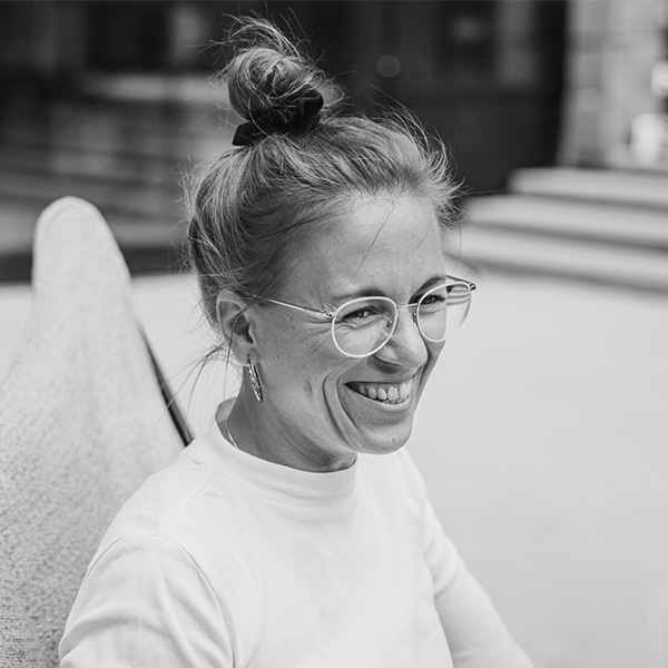 Scene showing a woman sitting on a chair