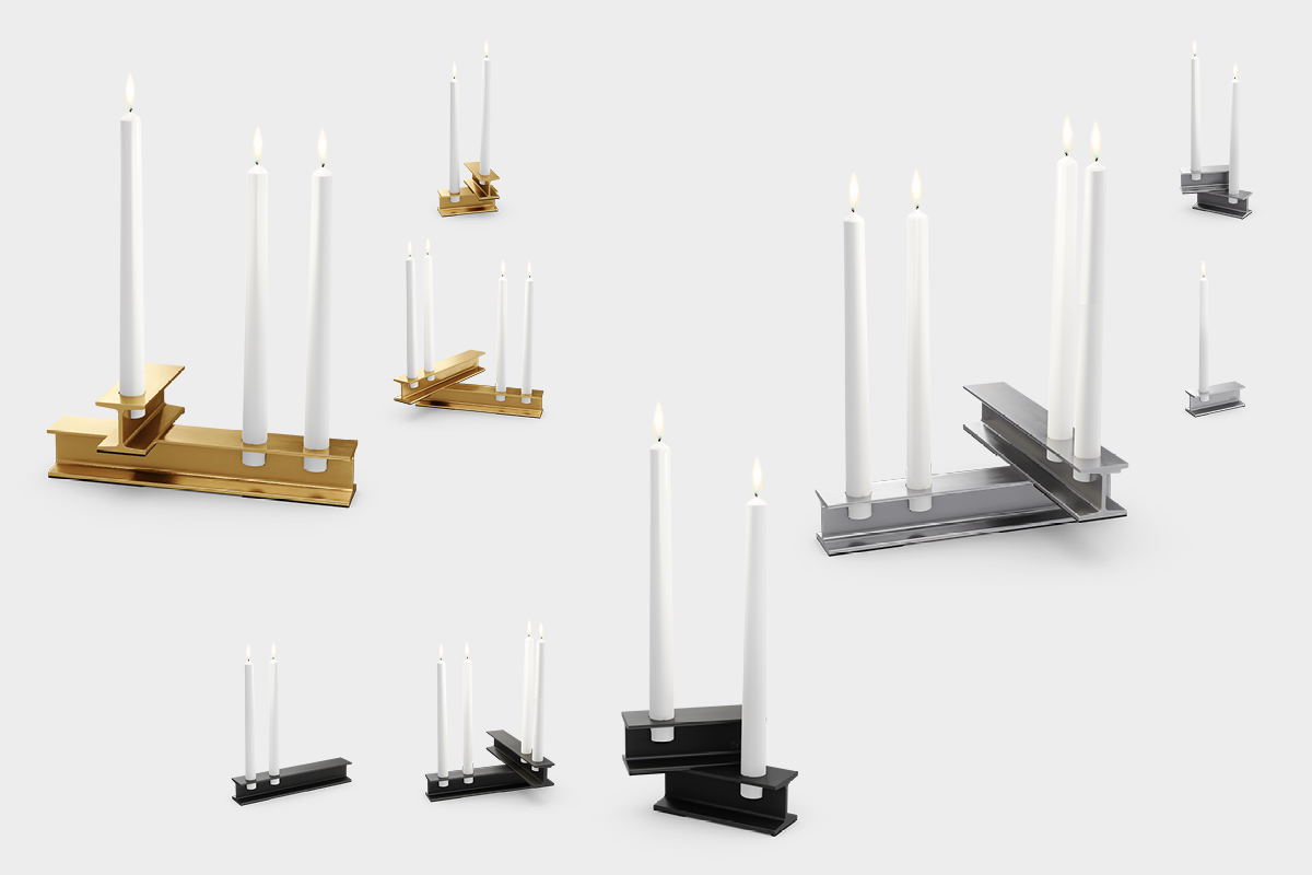 a group of candles with a metal holder