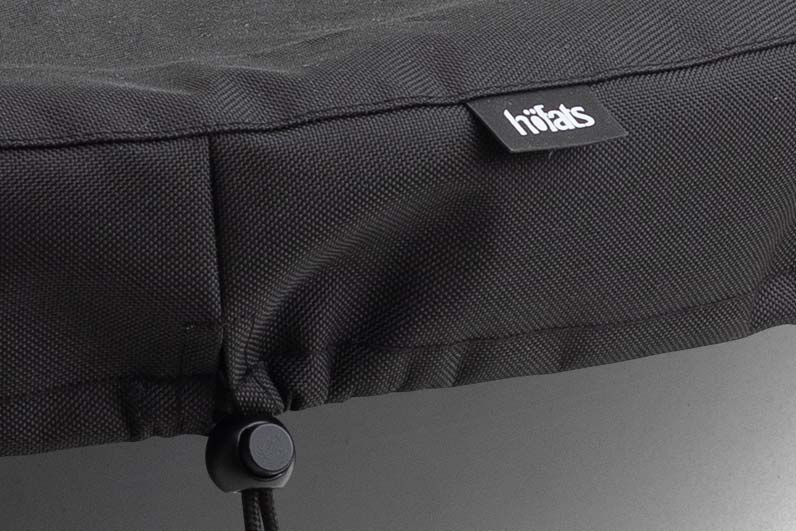 The photo presents a firebowl with a cloth cover, with the BOWL 70 Cover.