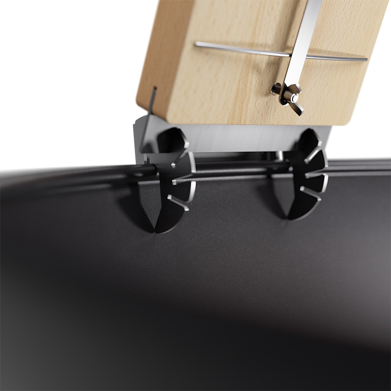 Flame-grilled salmon board The photo presents a black suitcase with a wooden handle, with the Flame-grilled salmon board.