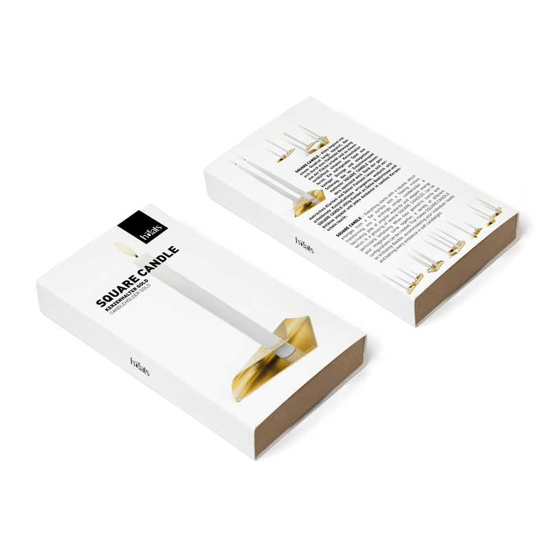 An inviting scene highlights the Square Candle Candleholder Gold Packaging, blending effortlessly into its surroundings.