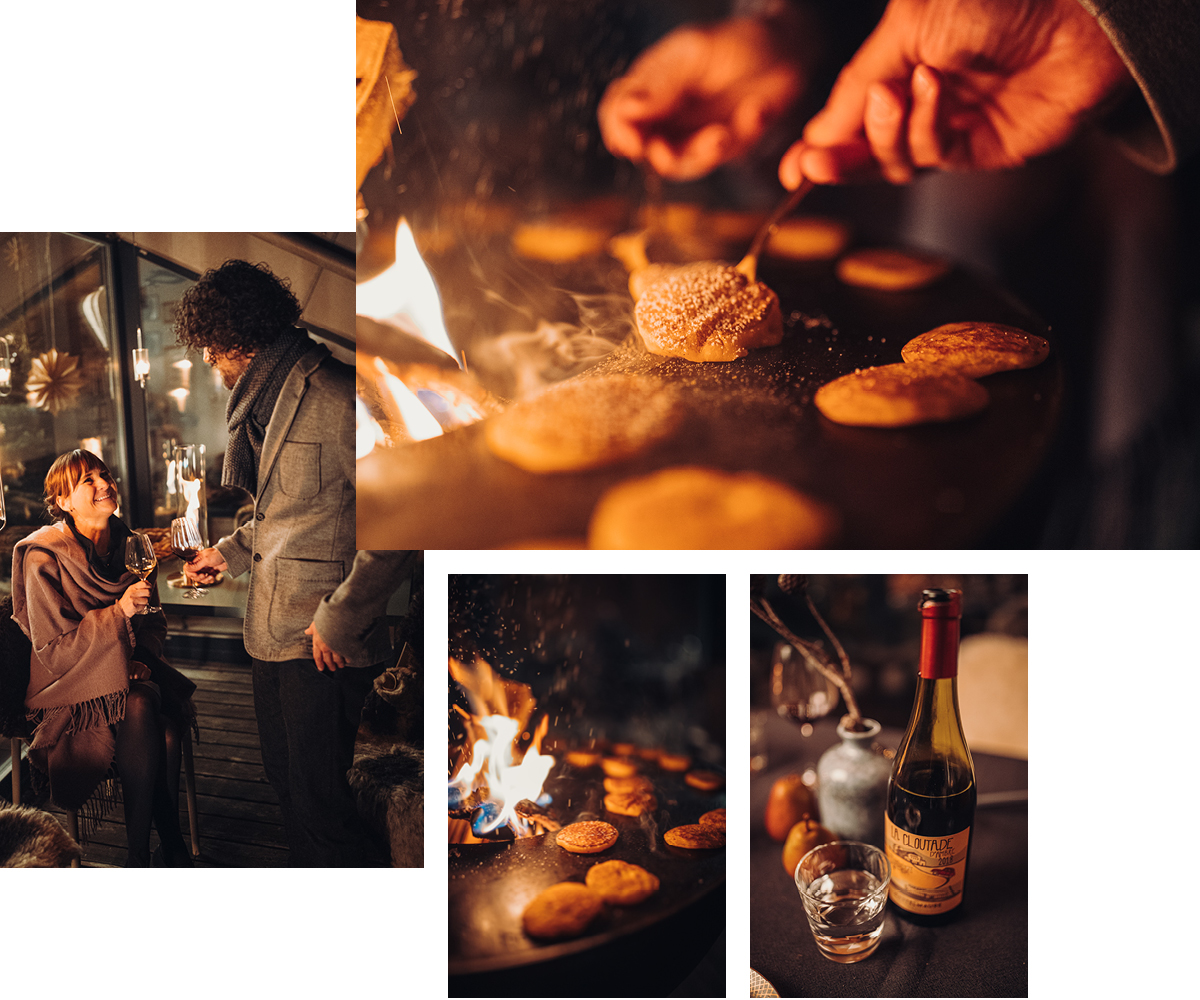 a man and woman are cooking food in a kitchen.