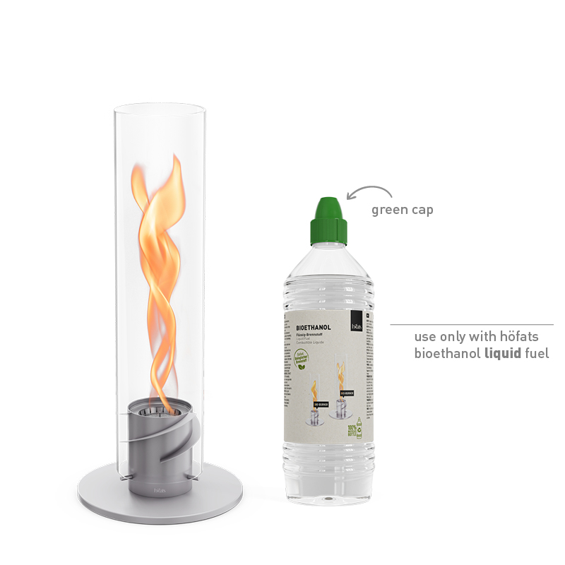 SPIN 1200 Tabletop Fireplace grey A white background with the 00697 Spin 1200 Tablefire grey and a bottle of bioethanol liquid