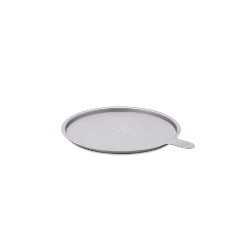 A view of a round tray with a lid, with the SPIN 120 Table Fire grey.
