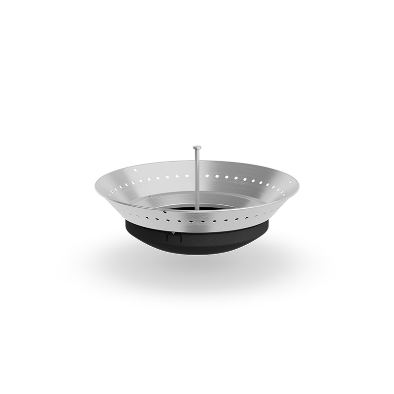 An inviting scene with a large metal bowl with a handle, highlighted by the presence of the 00721 Moon 45 Ashtray.