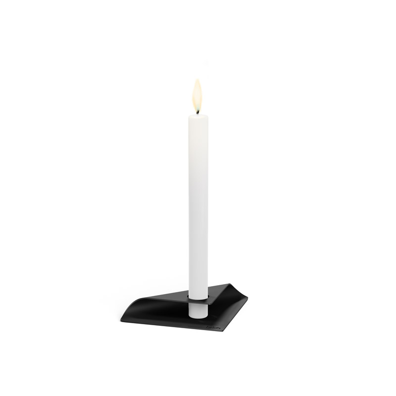 SQUARE CANDLE Candleholder black A view of a white candle on a black stand, with the SQUARE CANDLE Candleholder black.