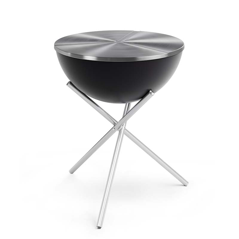 A view of the black side table with a metal base, with the BOWL 70 Fire Bowl with Tripod.