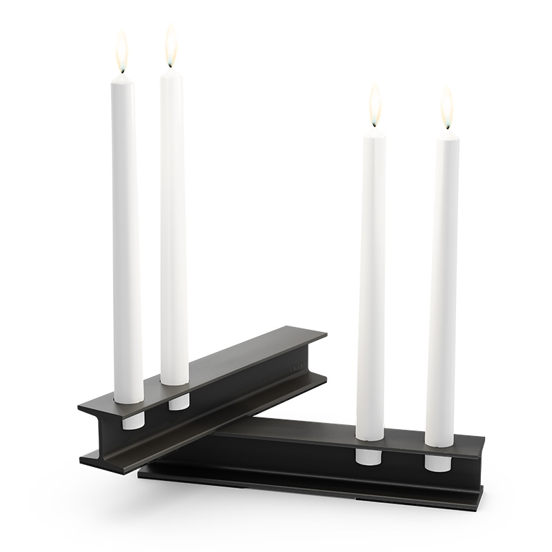 This image shows a pair of candles on a black stand, with the HENRY METAL II Candleholder black.