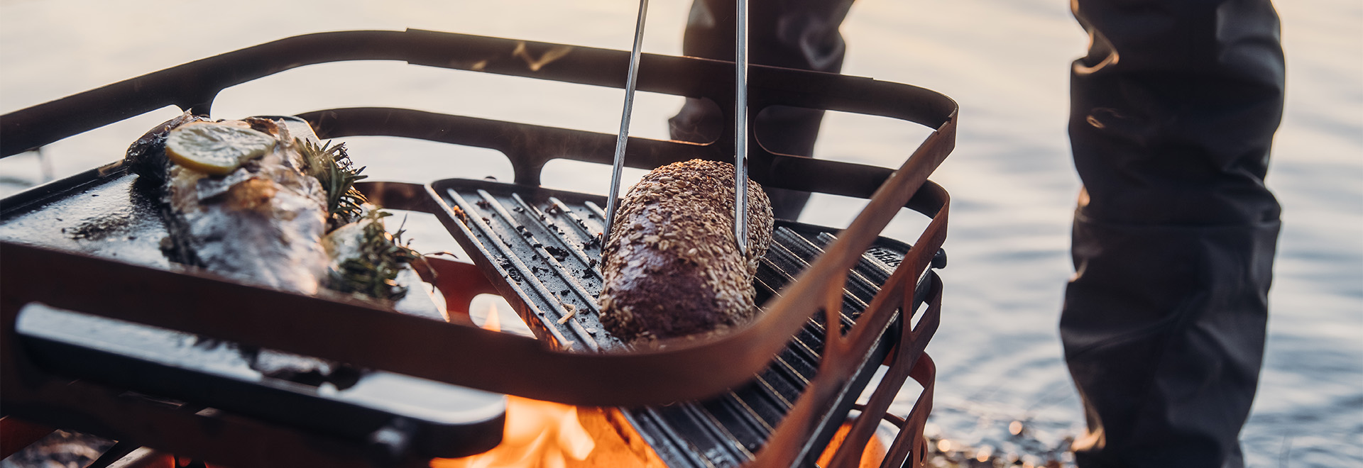 a person is cooking food on a grill