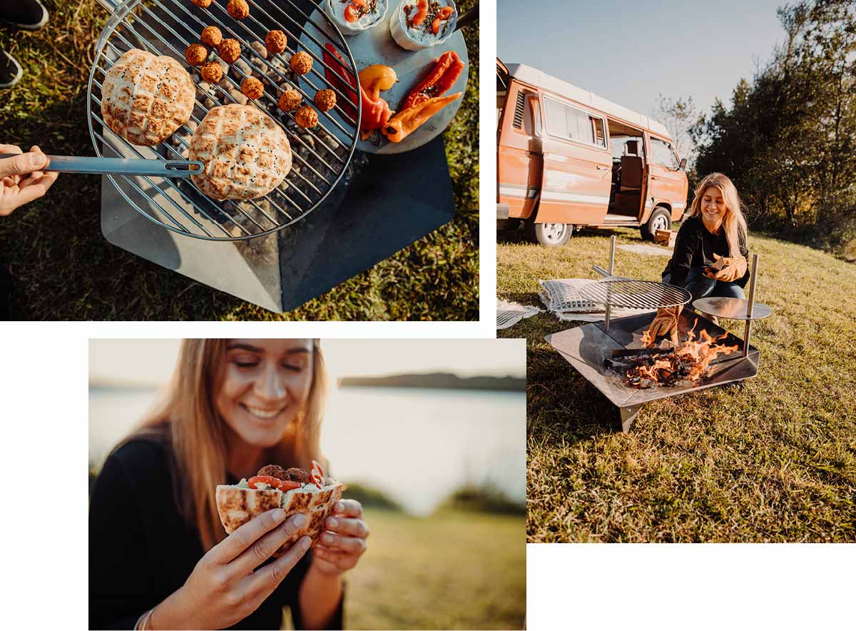 Scene showing a woman sitting on a blanket in front of a camper