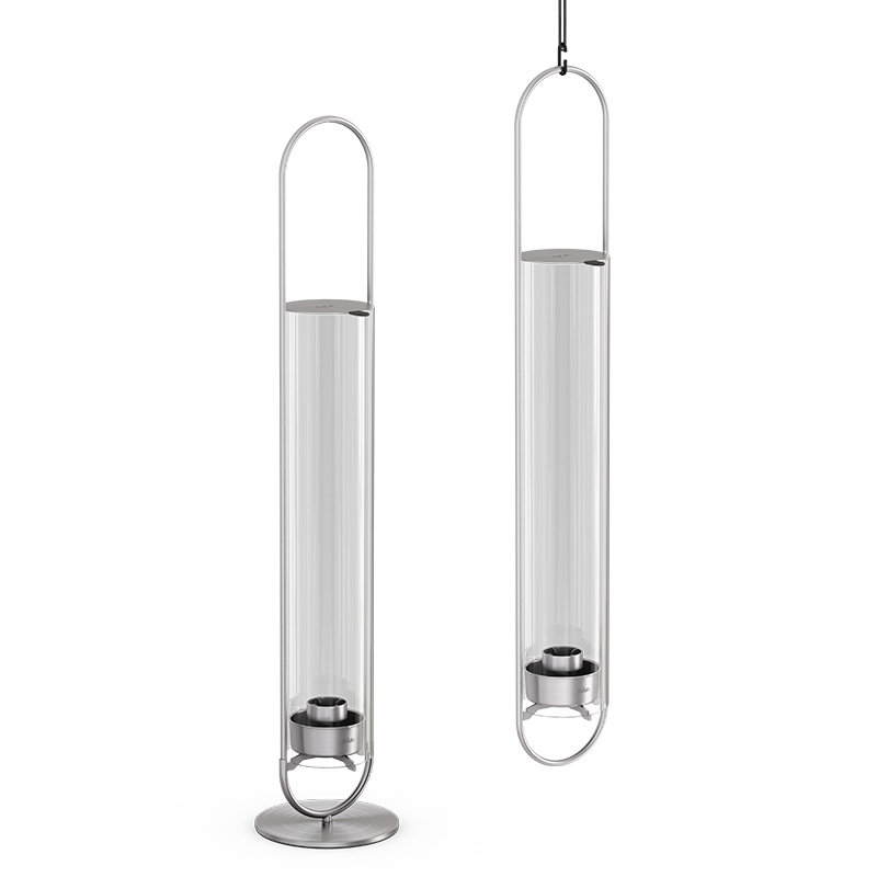OVAL CANDLE 55 Candleholder silver The 00271 Oval Candle 55 integrates seamlessly into the setting, where a pair of metal candleholders with glass cylinders