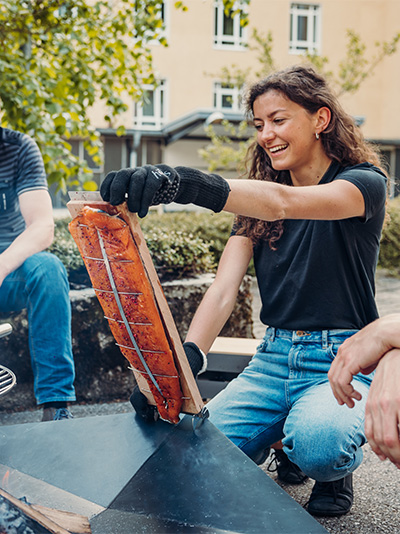 a man and woman sitting on a bench