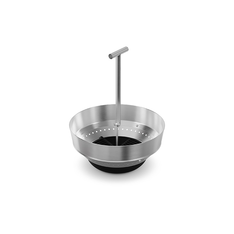 Scene showing a stainless bowl with a handle, where the 00973 Moon 45 Ash tray with extension stands out for its practical elegance.