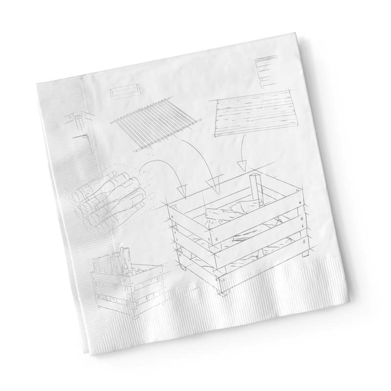 An image showing a napkin with a drawing of a house, with the CRATE Fire Basket.