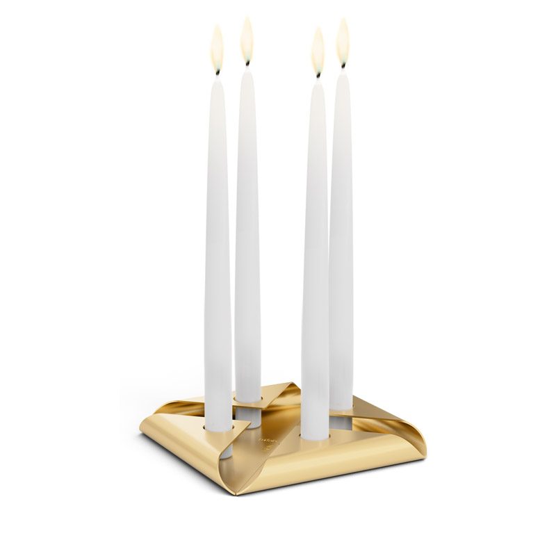 An image showing a pair of candles on a gold stand, with the SQUARE CANDLE Candleholder Set gold.