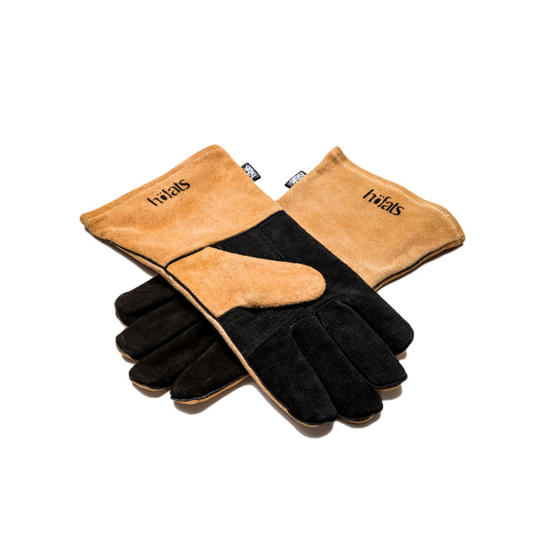 Fire Gloves Leather An image showing a pair of black and tan leather gloves